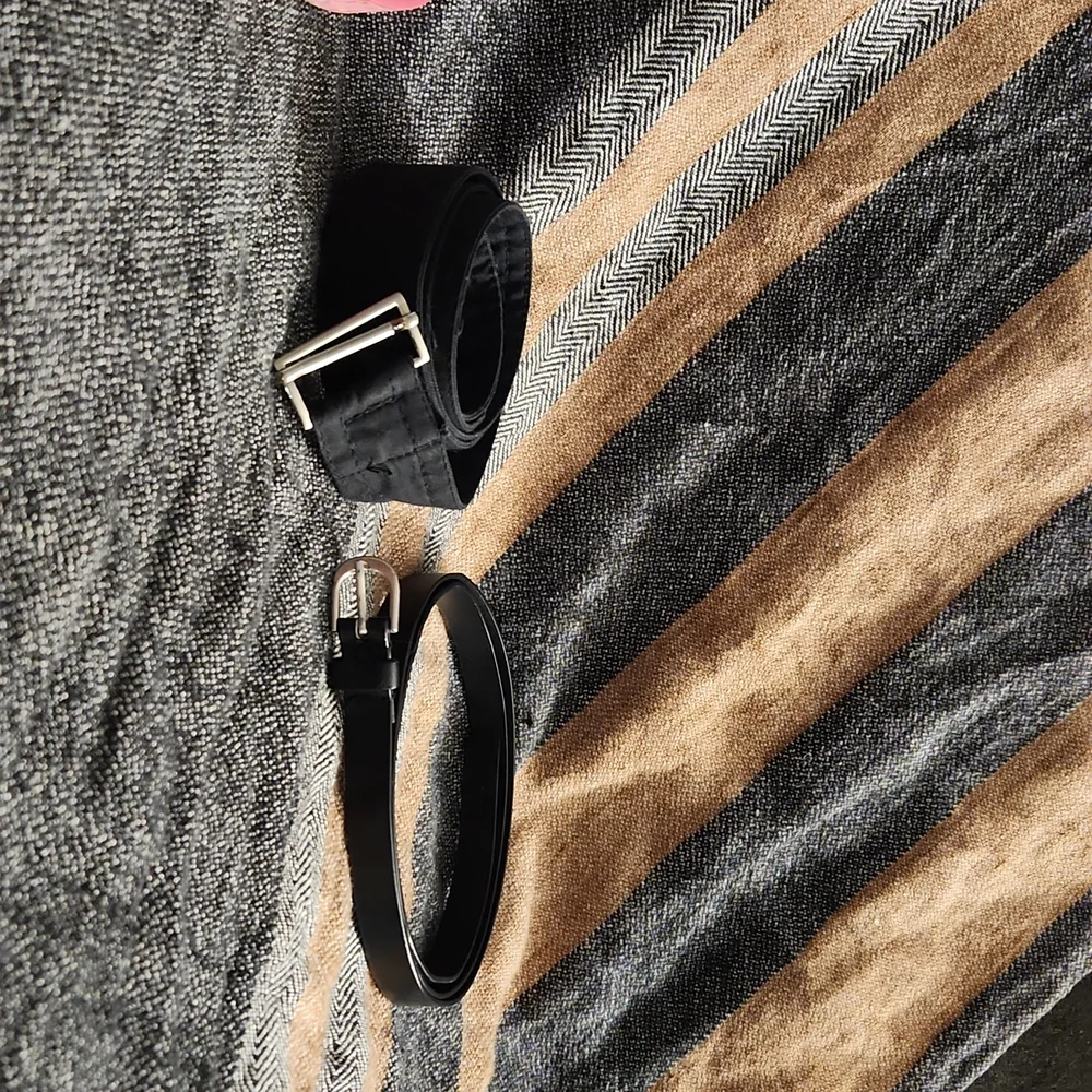 4 used belts printed pink and solid black